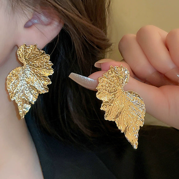 Wholesale Women's Silver Needle Hollow Flower Tassel Earrings With Real Gold Electroplating Zircon Star Pattern