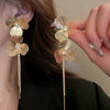 Wholesale Women's Silver Needle Hollow Flower Tassel Earrings With Real Gold Electroplating Zircon Star Pattern