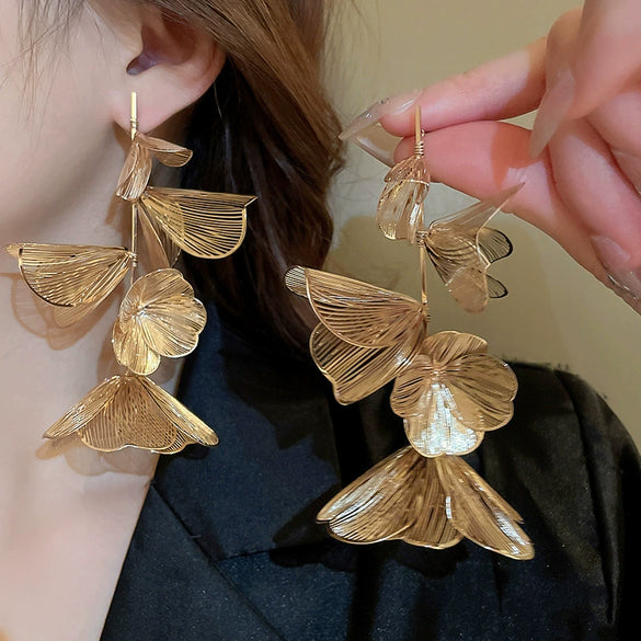Wholesale Women's Silver Needle Hollow Flower Tassel Earrings With Real Gold Electroplating Zircon Star Pattern