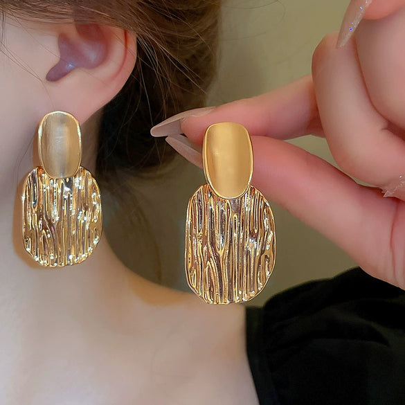 Wholesale Women's Silver Needle Hollow Flower Tassel Earrings With Real Gold Electroplating Zircon Star Pattern