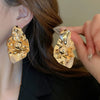 Wholesale Women's Silver Needle Hollow Flower Tassel Earrings With Real Gold Electroplating Zircon Star Pattern
