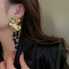 Wholesale Women's Silver Needle Hollow Flower Tassel Earrings With Real Gold Electroplating Zircon Star Pattern