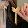 Wholesale Women's Silver Needle Hollow Flower Tassel Earrings With Real Gold Electroplating Zircon Star Pattern