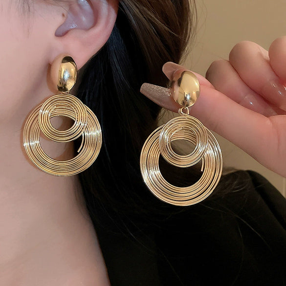 Wholesale Women's Silver Needle Hollow Flower Tassel Earrings With Real Gold Electroplating Zircon Star Pattern