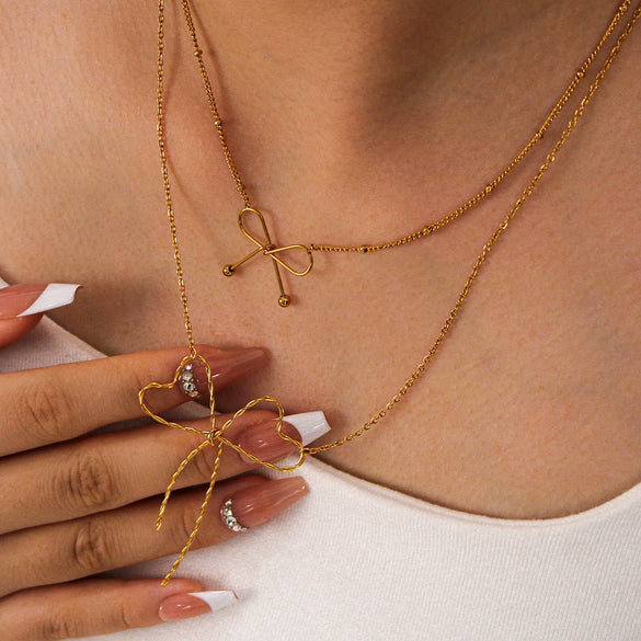 Wholesale Women's Simple Fashion Bow Geometric 18K Gold Plated Titanium Steel Necklace