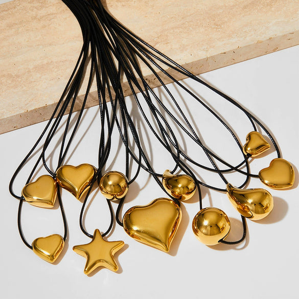 Wholesale Women's Simple Fashion Exaggerated Hollow Five Pointed Star And Heart Pendant Necklace With Wax Rope Chain Made Of Stainless Steel With Electroplating Treatment