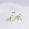Wholesale Women's Simple Fashion Flower Shape Copper Diamondencrusted Electroplated Earrings