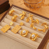Wholesale Women's Simple Geometric Goldplated Titanium Steel Shell Beads Earrings With Imitation Pearl Casting Design
