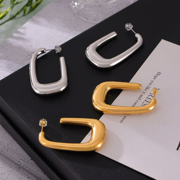 Wholesale Women's Simple Geometric Goldplated Titanium Steel Ushaped Oval Hollow Earrings