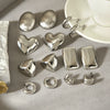 Wholesale Women's Simple Glossy Heartshaped Geometric Stainless Steel Polished Earrings