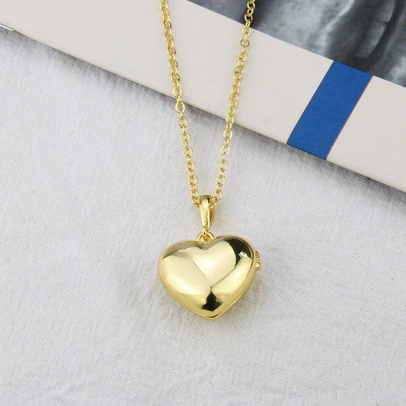 Wholesale Women's Simple Gold Plated Copper Hollow Heart Shaped Open Pendant Necklace With O Chain
