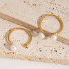 Wholesale Women's Simple Minimalist Geometric Stainless Steel Opening Ring With Pvd Furnace Vacuum Real Gold Plating And Natural Steamed Bread Pearl