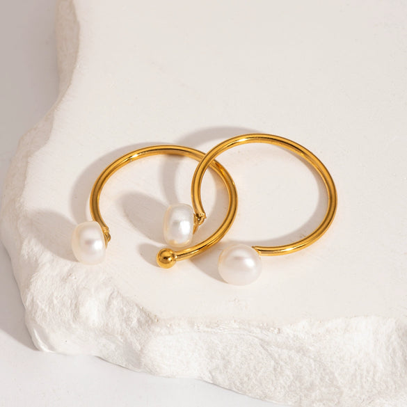 Wholesale Women's Simple Minimalist Geometric Stainless Steel Opening Ring With Pvd Furnace Vacuum Real Gold Plating And Natural Steamed Bread Pearl