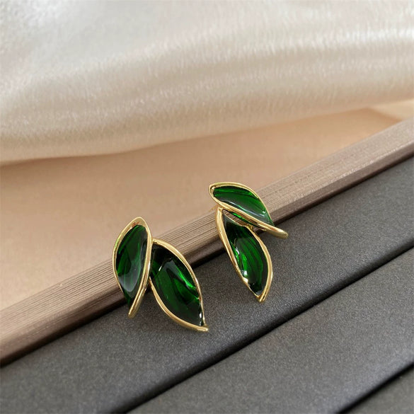 Wholesale Women's Simple Plant Flowers Style Alloy Dripping Oil Leaf Earrings