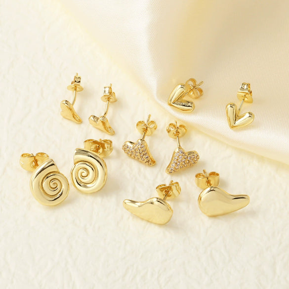 Wholesale Women's Simple Style Heartshaped Copper Earrings With Electroplating