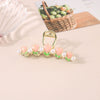 Wholesale Women's Simple Tulip Alloy Hair Clips With Electroplating Treatment
