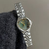 Wholesale Women's Snakeshaped Steel And Alloy Band Watch With Heartshaped Dial And Flat Top Tapered Crown