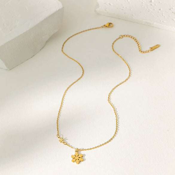 Wholesale Women's Snowflake And Flower Pendant Titanium Steel Electroplated Necklace With O Word Chain Sweet Minimalist Design