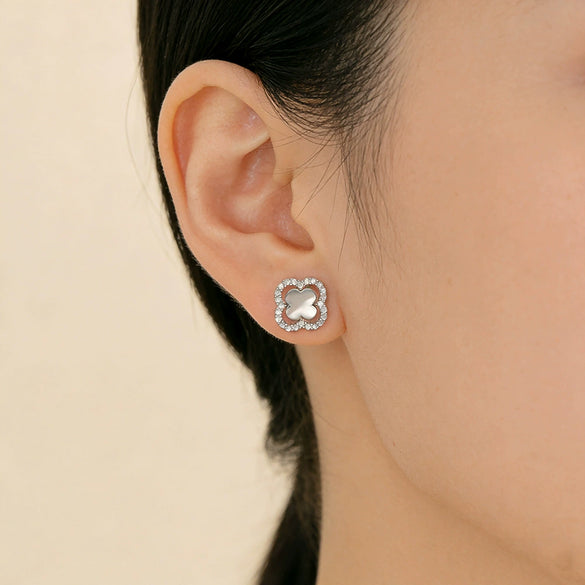 Wholesale Women's Sophisticated Diamond Leaf Pattern Copper Inlaid Zircon Four Leaf Clover Hollow Earrings