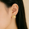 Wholesale Women's Sophisticated Diamond Leaf Pattern Copper Inlaid Zircon Four Leaf Clover Hollow Earrings