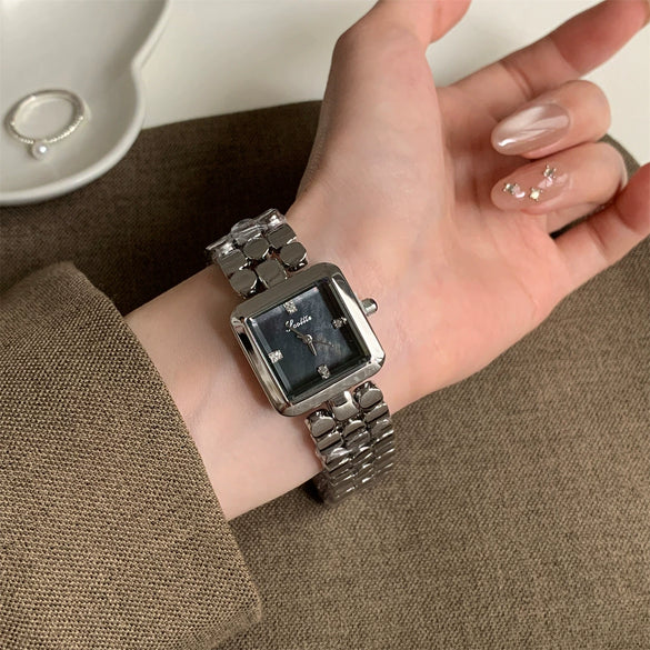 Wholesale Women's Squareshaped Scottie Steel Band Watch With Motherofpearl Square Dial And Ordinary Glass Mirror