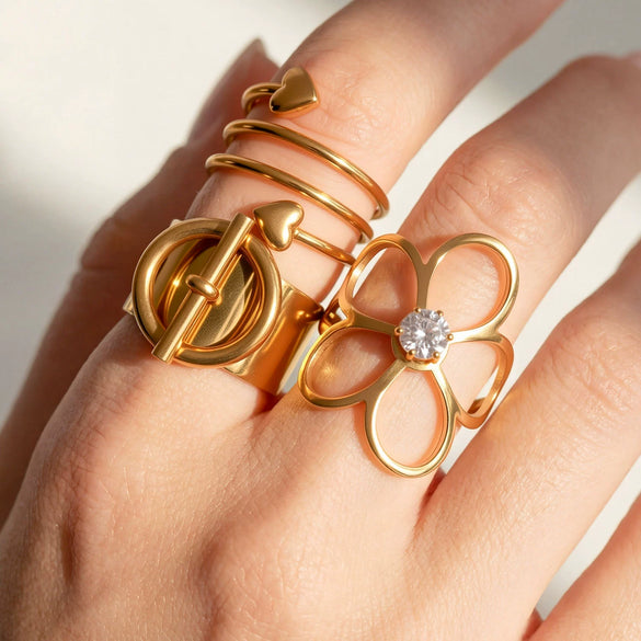 Wholesale Women's Stacking Stainless Steel Goldplated Ring With Geometric Heart Flower And Four Leaf Clover Shapes And Diamond Design