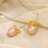 Wholesale Women's Stainless Steel And Pearl Bow Earrings With Electroplating Treatment