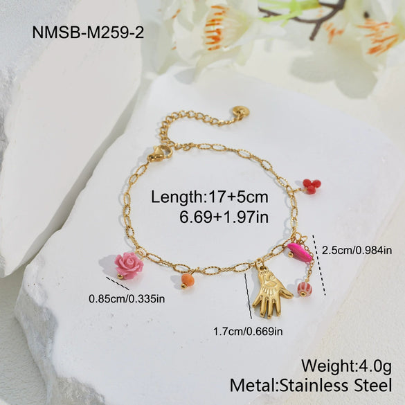 Wholesale Women's Stainless Steel And Titanium Steel Accessories Set With Heart Drop And Bell Patterns Electroplated Design