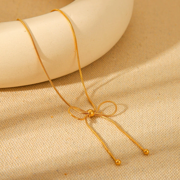 Wholesale Women's Stainless Steel And Titanium Steel Bow Geometric Retro Elegant Snake Bone Chain Necklace With Electroplating