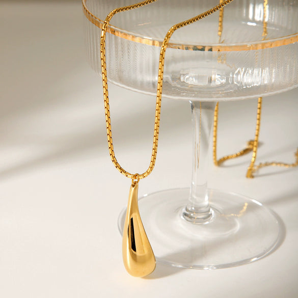 Wholesale Women's Stainless Steel And Titanium Steel Drop Shape Hollow Pendant Necklace With Electroplating