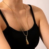 Wholesale Women's Stainless Steel And Titanium Steel Drop Shape Hollow Pendant Necklace With Electroplating