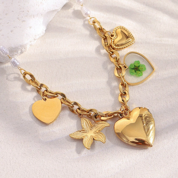 Wholesale Women's Stainless Steel And Titanium Steel Heart Shaped Imitation Pearl Pendant Necklace With 18K Gold Plated Electroplating
