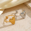 Wholesale Women's Stainless Steel And Titanium Steel Heartshaped Open Ring With Hammer Pattern And 18K Goldplated Electroplating