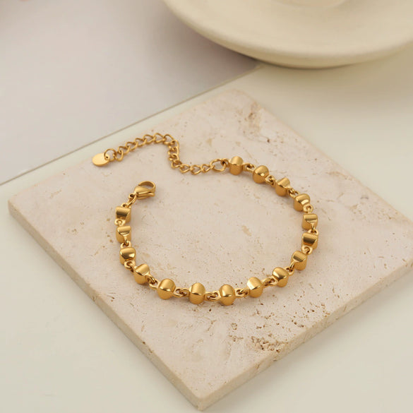 Wholesale Women's Stainless Steel And Titanium Steel Jewelry Set With Heart Water Drop Bell Geometric Patterns Gold Electroplated Clavicle Chain Necklace And Bracelet