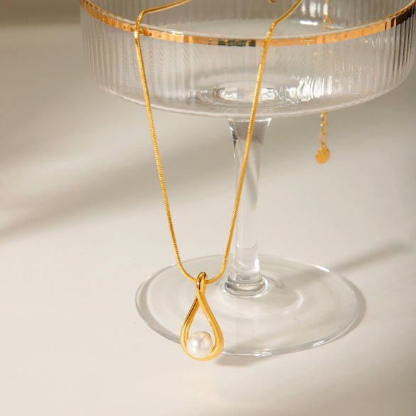 Wholesale Women's Stainless Steel And Titanium Steel Pearl Pendant Necklace With Hollow Water Drop And Geometric Pattern And Electroplating Treatment