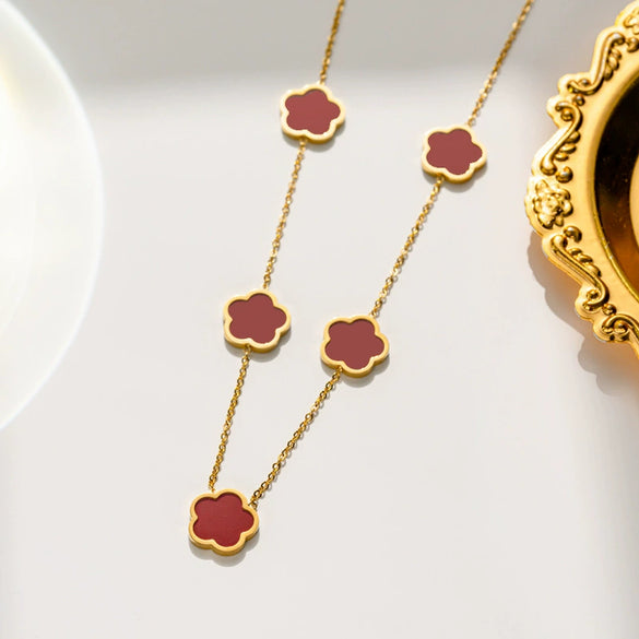 Wholesale Women's Stainless Steel And Titanium Steel Plant Fritillaria Fiveleaf Petal Jewelry Suit With Geometric Pattern And Gold Inlaid Treatment