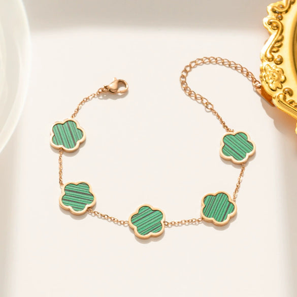 Wholesale Women's Stainless Steel And Titanium Steel Plant Fritillaria Fiveleaf Petal Jewelry Suit With Geometric Pattern And Gold Inlaid Treatment