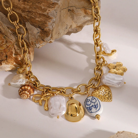 Wholesale Women's Stainless Steel Bow Love Pendant Necklace With Pearl Animal Pattern And Electroplating