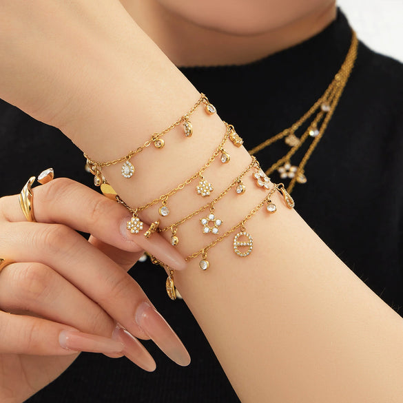 Wholesale Women's Stainless Steel Cross Crown Roman Numerals Pattern Electroplated Multipendant Necklace Bracelet Set