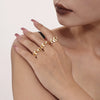 Wholesale Women's Stainless Steel Dripping Oil Leaves Drop Finger Ring With 18K Gold Plated Electroplating In Light Luxury Style