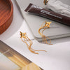 Wholesale Women's Stainless Steel Electroplated Geometric Fourpointed Star Tassel Earrings