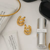 Wholesale Women's Stainless Steel Electroplated Irregular Three Layer Wave Style Earrings