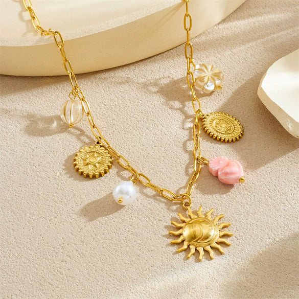 Wholesale Women's Stainless Steel Electroplated Jewelry Set With Stars Sun And Moon Clouds And Universe Patterns Round Heartshaped Pendant And Cross Chain