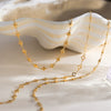 Wholesale Women's Stainless Steel Electroplated 18K Gold Necklace With Fivepointed Star Cut Out Fourleaf Clover Heart And Round Beads