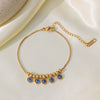 Wholesale Women's Stainless Steel Electroplated Necklace Suit With Blue Eyes And Devil's Eye Design