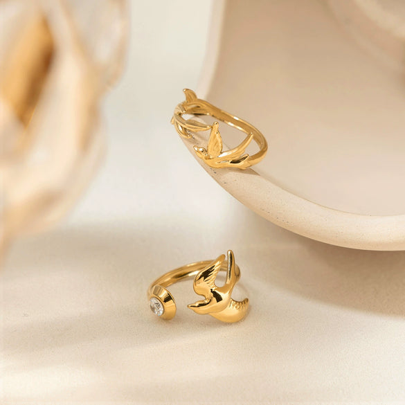 Wholesale Women's Stainless Steel Electroplated Winged Ring With Peace Dove And Olive Leaf Design