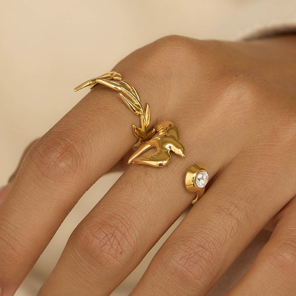 Wholesale Women's Stainless Steel Electroplated Winged Ring With Peace Dove And Olive Leaf Design