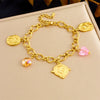 Wholesale Women's Stainless Steel Flower Patterned Pendant Bracelet With Electroplating Fashion Design