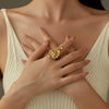 Wholesale Women's Stainless Steel French Retro Hollow Gold Flower Ring With Electroplating Treatment Light Luxury Style