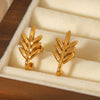 Wholesale Women's Stainless Steel Geometric And Flower Patterned Electroplated Stud Earrings